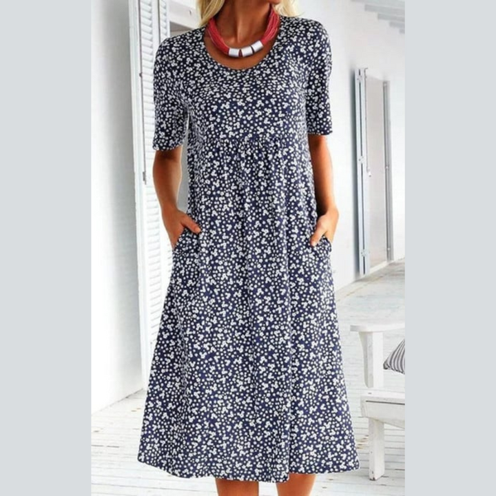 Amara | Stilfuld Blomsterprint Midi Kjole
